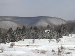 HILLTOP LODGE IN WINTER FROM ATOP MX TRACK
